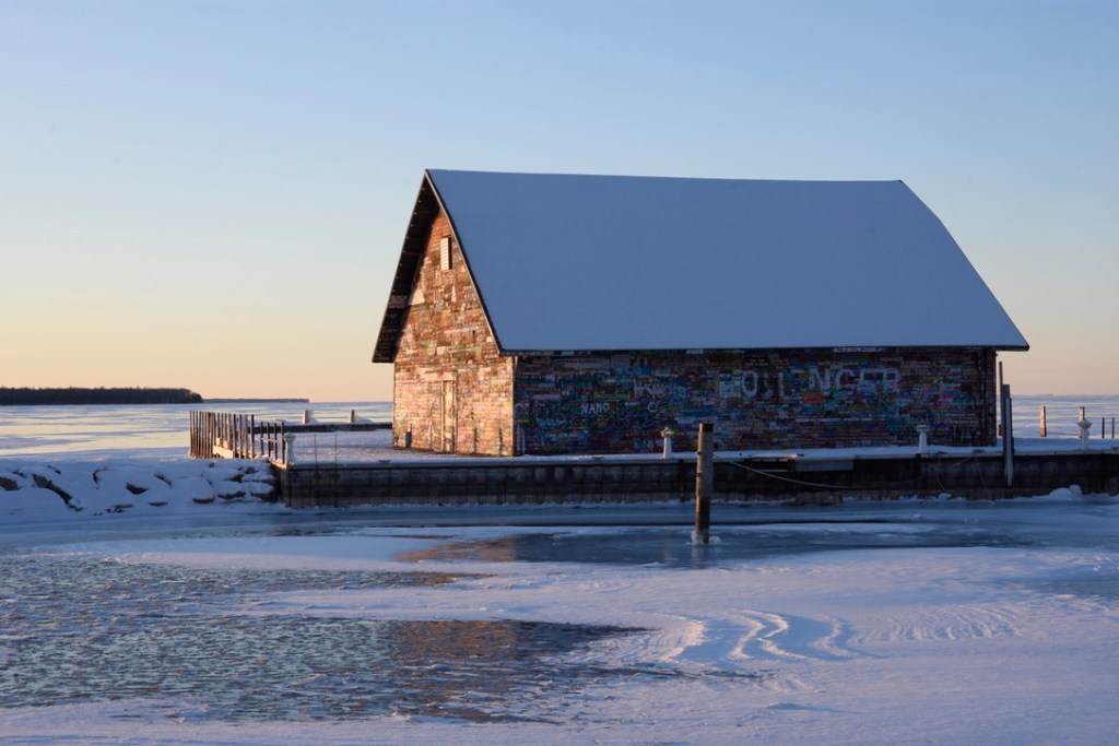 Anderson's Dock, highlighted by the crisp evening light of winter, sits like a block of ice on the frozen waters of the Green Bay.