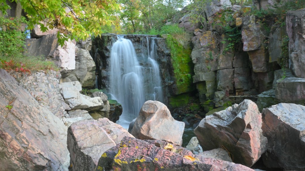 Winnewissa Falls, flowing over ancient Sioux Quartzite, has long been a spiritual landmark and a place of offering.