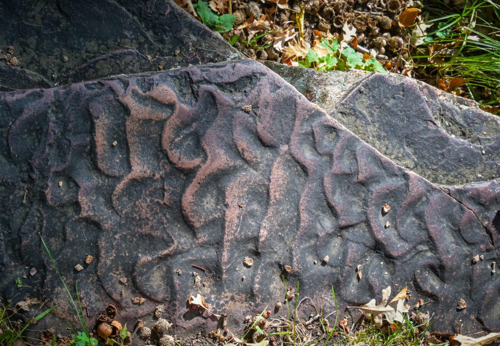 Wave-like patterns on ancient stone in Pipestone National Monument