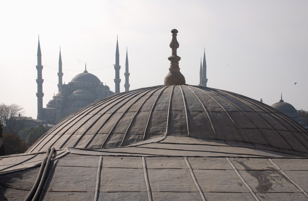 From a window in the Hagia Sophia, the domes and minarets of the Blue Mosque