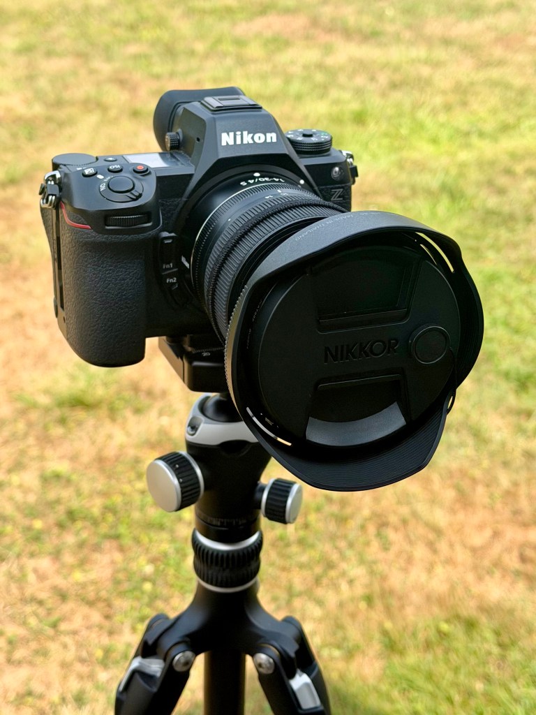 photo of a Nikon Z6lll camera with a Nikkor 14-30mm lens on a Gitzo tripod